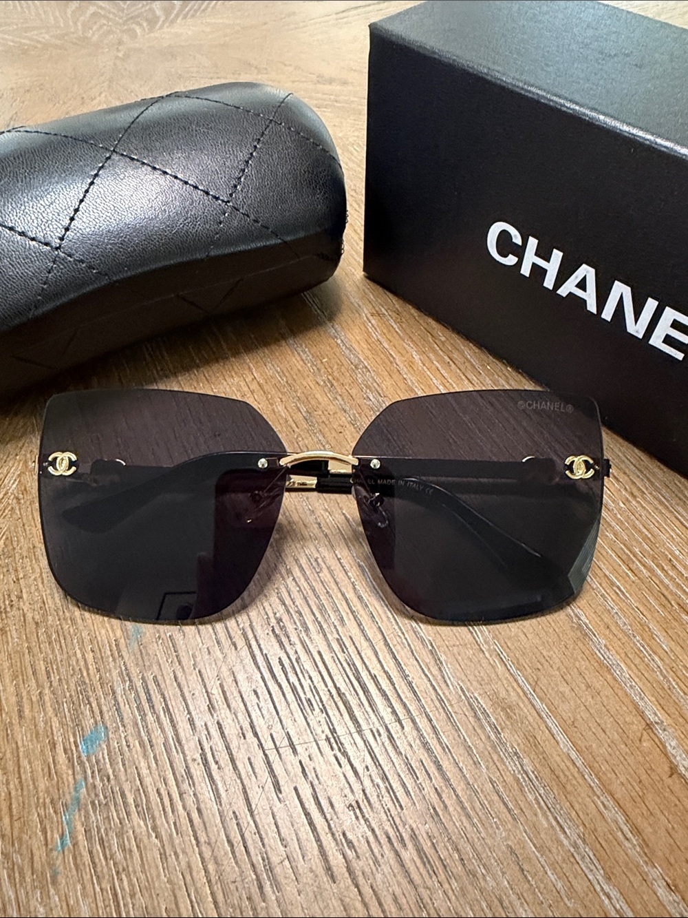 CHANEL Men’s Black Square Rimless Sunglasses with Gold CC Accents